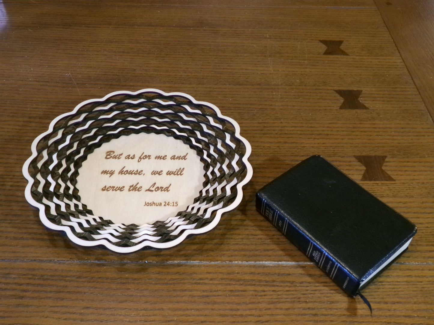 But as for me and my house, we will serve the Lord. What a wonderfully crafted way to show your Christian values. This uniquely designed basket is made with alternating light and dark stained rings that create a beautiful, patterned accent decor. This laser cut piece is 10 5/8" diameter and 1 3/8" high. 