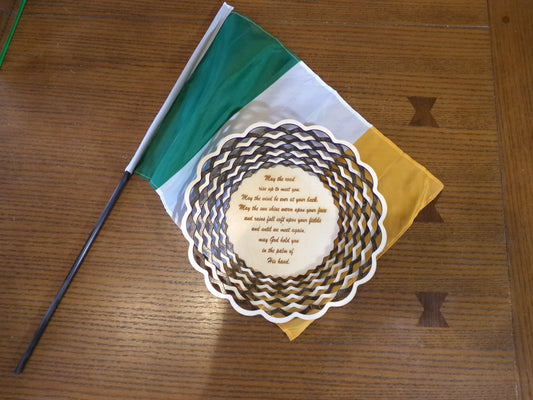 The traditional Irish blessing and prayer for those who want to bestow favor to others on their journey of life. This uniquely designed basket is made with alternating light and dark stained rings that create a beautiful, patterned basket. This piece is 10 5/8" diameter and 1 3/8" high.